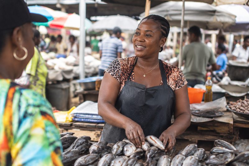 Commerçante au marché de poisson, bénéficiaire CEIMIPRO